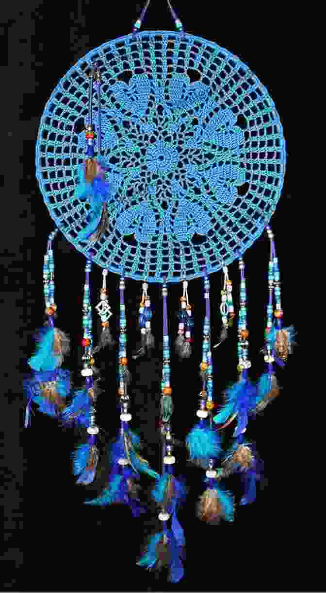 A Close Up Of An Annie Crochet Dream Catcher, Showcasing The Intricate Crochet Work And The Vibrant Beads That Adorn It. Dream Catchers (Annie S Crochet)