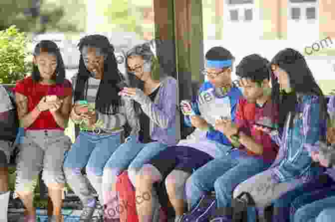 A Group Of Teenagers Using Smartphones And Social Media. Children Of Tomorrow: Guidelines For Raising Happy Children In The 21st Century