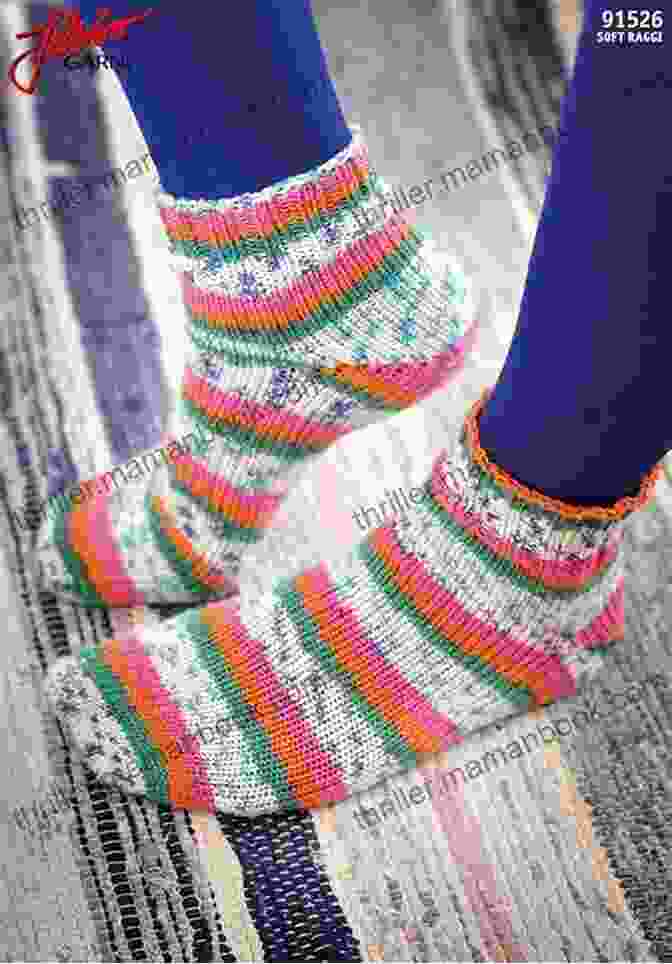 A Pair Of Knitted Magic Loop Socks In A Vibrant Blue Yarn, Showcasing The Seamless And Stretchy Construction Of This Technique. Learn To Knit Magic Loop Socks