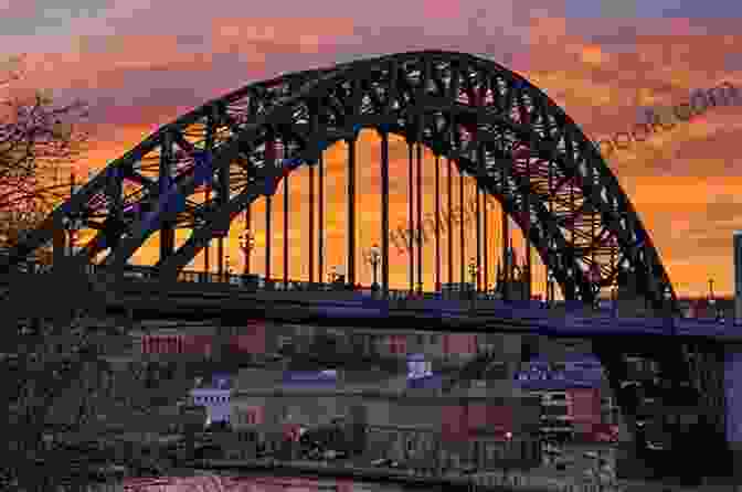 The Angel Bridge Illuminated At Sunset, Casting A Golden Glow Over The River Tyne. The Angel S Bridge Peter E Knox